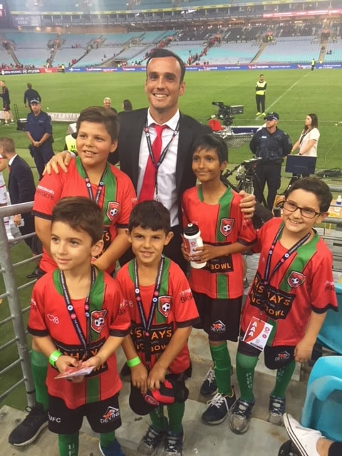 Mark Bridge and young WSW fans | Turner Freeman Lawyers